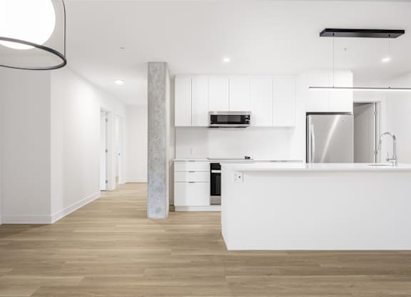 Open Kitchen at Lynk De la Savane Apartments, Montreal, QC