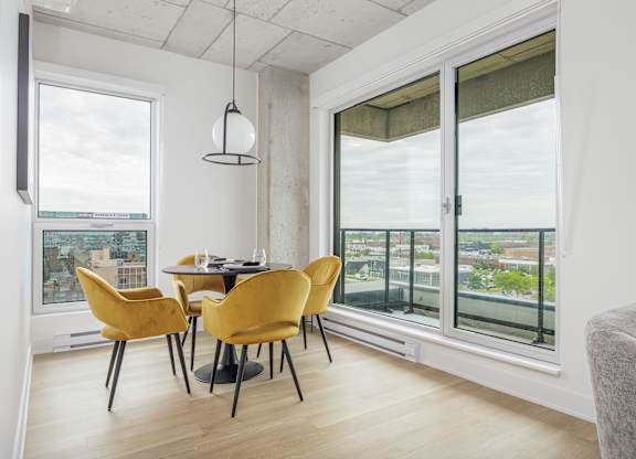 Elegant Dining Area at Lynk De la Savane Apartments, Montreal, Québec