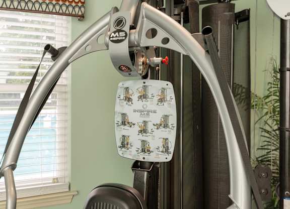 A close up of a piece of exercise equipment with a diagram on it at Sawbranch Apartments, Summerville, SC, 29485