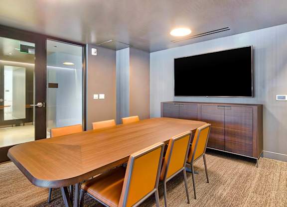 A conference room with a long table and chairs.at Eleven Fifty Clay Street, California  