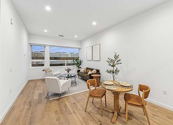 Dining room with a wooden table at 701 Hudson, Los Angeles, CA, 90005