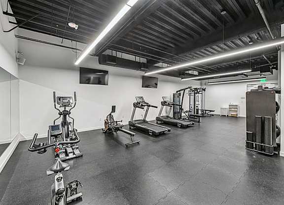 Gym with a variety of equipment at 701 Hudson, Los Angeles, California, 90005