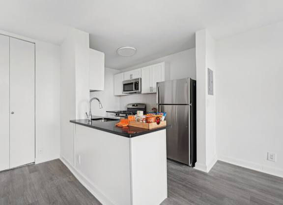 Modern Kitchen With Island at Ashlawn at Southern Towers, Alexandria, Virginia