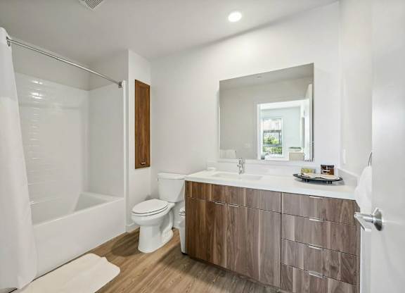 Bathroom with sink and mirror at Bayview Apartments, Emeryville, CA, 94608