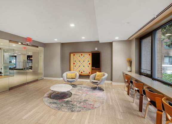 Clubroom with desks at The Graham at Southern Towers, Alexandria, VA