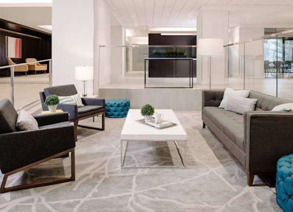 Living room with couch at The Graham at Southern Towers, Virginia, 22311