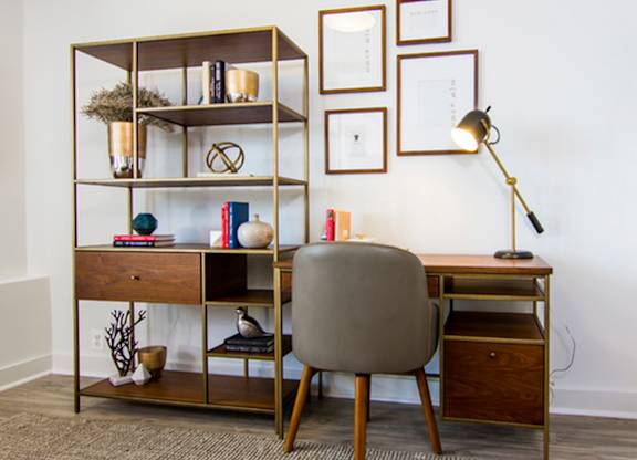 Decorated desk with chair at The Graham at Southern Towers, Alexandria
