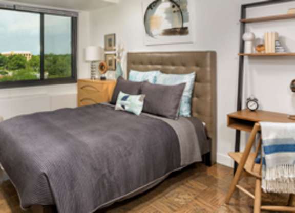 Bedroom with ceiling fan at The Graham at Southern Towers, Alexandria, VA, 22311
