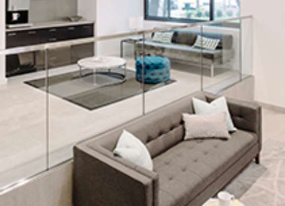 Clubhouse with couch at The Graham at Southern Towers, Alexandria, 22311