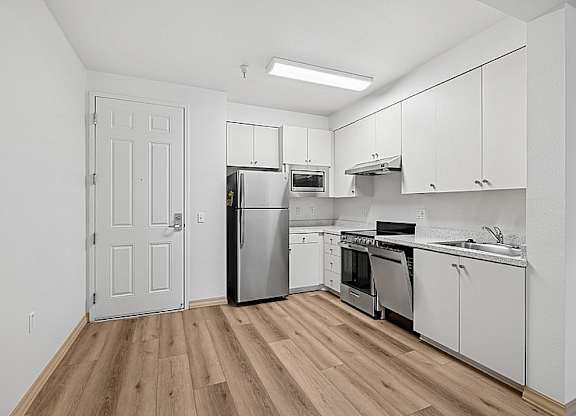 Kitchen with wooden floor at Parkview Living Apartments, California, 90026