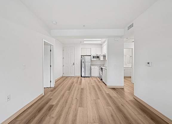 Open floorplan with wooden floor at Parkview Living Apartments, Los Angeles, California, 90026