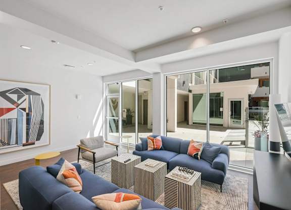 Beautiful living room with natural light at Sora Apartments, Inglewood