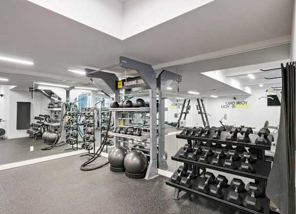 Fitness center with variety of equipments at Sora Apartments, Inglewood, California, 90302