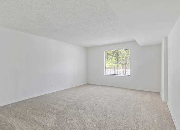 Spacious unfurnished living room with window at Vistas of Annandale, Annandale, Virginia
