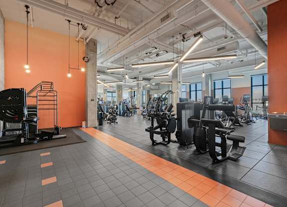 Gym with weightlifting equipments at Velaris Living Apartments, Denver, 80205
