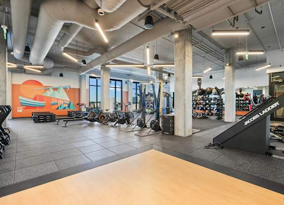 Fitness center with variety of equipments at Velaris Living Apartments, Denver, CO