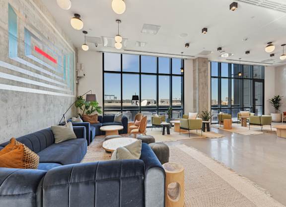 Common living area with couch at Velaris Living Apartments, Colorado