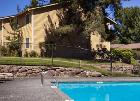A pool with a 3 feet depth marker.