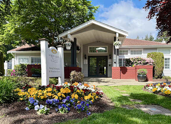 The front of a building with a sign that says Forest Grove.