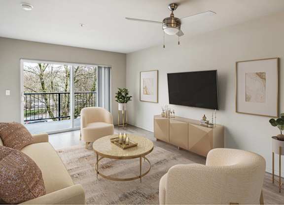 A living room with a flat screen TV mounted on the wall.
