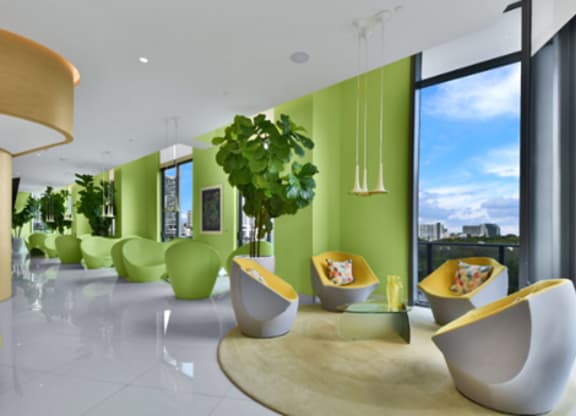 A modern living room with green and yellow accents.