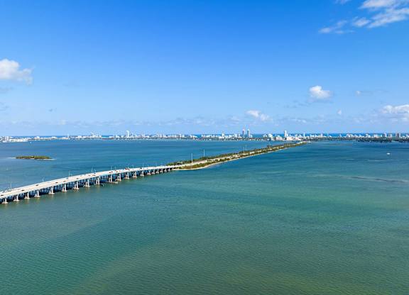 A long pier extends into a body of water.