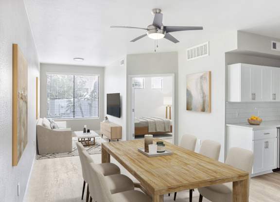 A modern dining room with a wooden table and chairs.