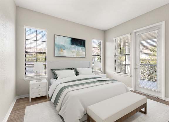 A bedroom with a large bed, a nightstand, a bench, and a painting on the wall.