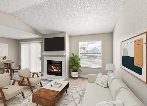 A living room with a fireplace, a couch, a chair, a table, a potted plant, and a painting on the wall.
