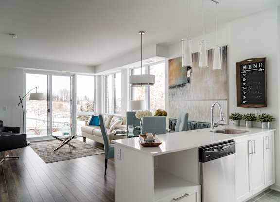 Open concept kitchen and living space at Kanata Lakes Apartments, Ottawa, Ontario