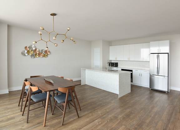 Open concept kitchen and dining space at 929 Richmond Apartments, Ontario