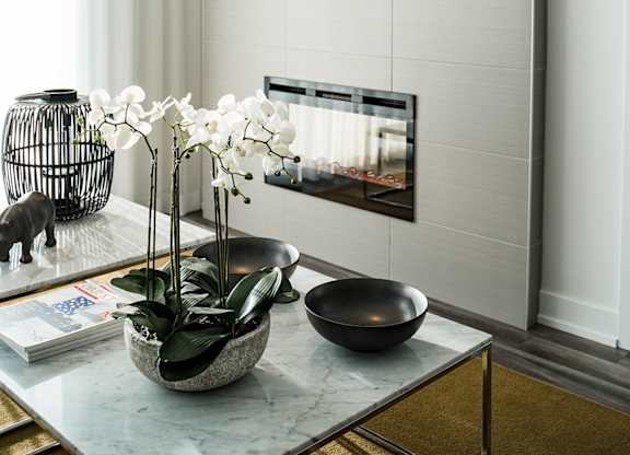 Modern living room with marble coffee table at Horizon Apartments, Gatineau