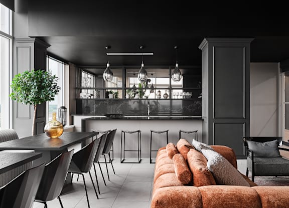 A modern kitchen with a dining table and chairs at Petries Landing I Apartments , Ottawa, K4A 1K4