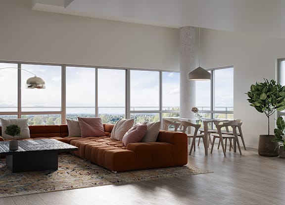 A modern living room with a large window overlooking the city at Petries Landing I Apartments , Ottawa