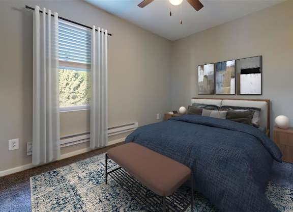 A bedroom with a bed, a bench, and a window with curtains at Ridgeview Apartments, Fortville 46060