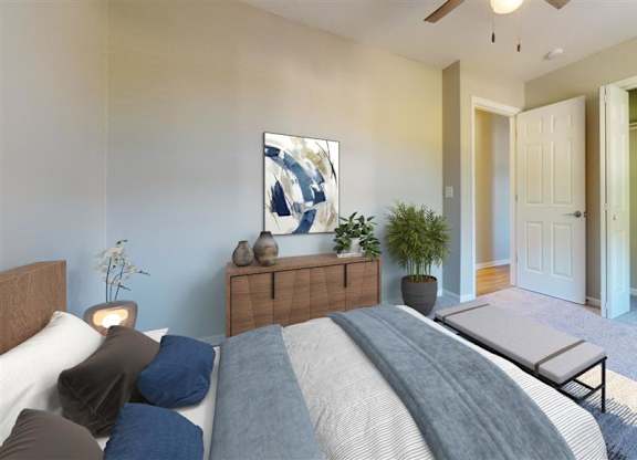 A bedroom with a bed, nightstand, and a painting on the wall at Ridgeview Apartments, Indiana, 46060