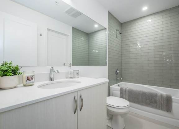 Modern White Bathroom at Ophelia on Queen Apartments, Kitchener, ON
