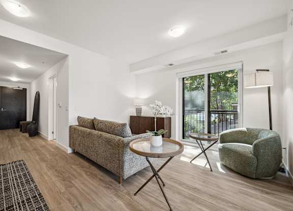 Bright living room at The Maverick Apartments, Kitchener, ON N2H 0E3