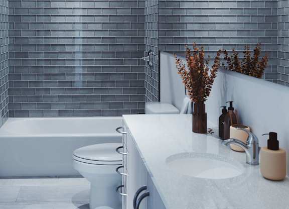 White Bathroom with a Tub at Ophelia on Queen Apartments, Kitchener, N2G 0E7