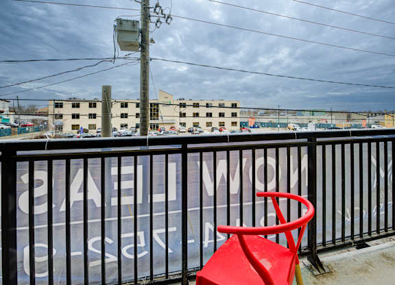 Balcony with Chair at The Maverick Apartments, Kitchener, ON, N2H 0E3