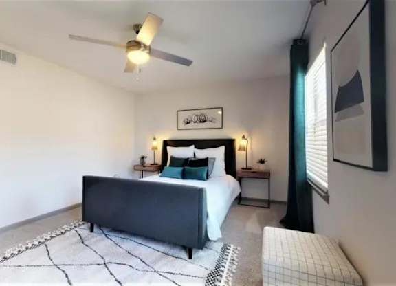 Bedroom With Ceiling Fan at Cumberland Pointe, Georgia, 30080