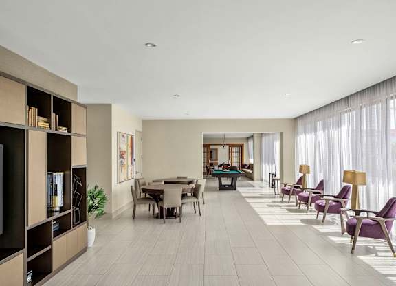A modern living room with a dining area and a television. at Palma, Florida
