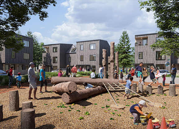 A playground with children playing and a building in the background at The Grindstone Apartments, Waterdown