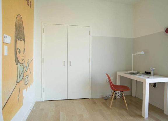 A room with a desk and a chair.at 66 Main, Yonkers, NY