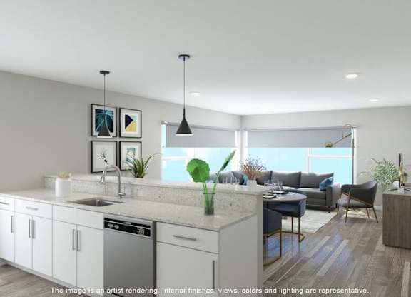A modern kitchen with a dining area and a living room.