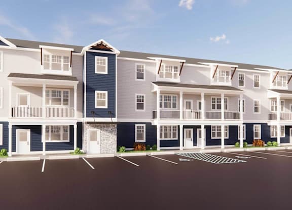 A row of townhouses with blue and white exteriors.
