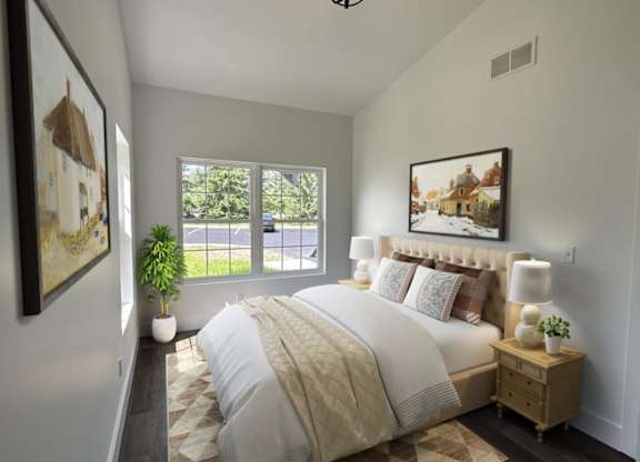 A bedroom with a large bed and a painting on the wall.