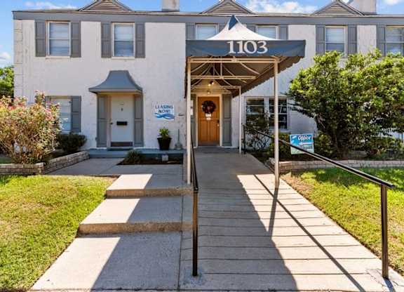 The front of apartment building number 1103 is shown with a leasing sign.