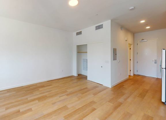 A room with wooden flooring and white walls.at The Dillon II at Silver Lake, Los Angeles, 90026