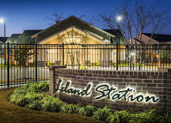 Property sign at Leland Station Apartments, Leland, NC